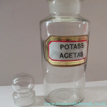 Load image into Gallery viewer, Antique Chemist Bottle with Ball Stopper and Foil Glass Covered Label
