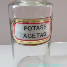 Load image into Gallery viewer, Antique Chemist Bottle with Ball Stopper and Foil Glass Covered Label
