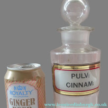 Load image into Gallery viewer, Antique Chemist Bottle with Ball Stopper and Foil Glass Covered Label
