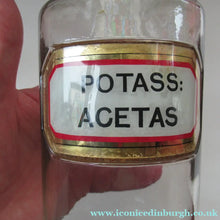Load image into Gallery viewer, Antique Chemist Bottle with Ball Stopper and Foil Glass Covered Label
