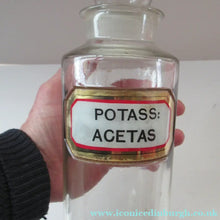 Load image into Gallery viewer, Antique Chemist Bottle with Ball Stopper and Foil Glass Covered Label
