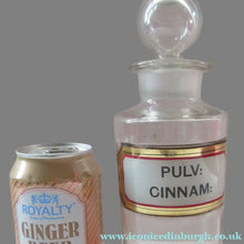 Load image into Gallery viewer, Antique Chemist Bottle with Ball Stopper and Foil Glass Covered Label
