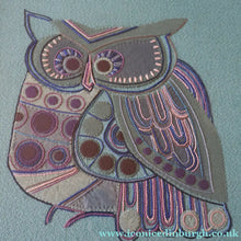 Load image into Gallery viewer, LARGE Kitsch Embroidery Turquoise Tweed Collage Panel Showing a Large Stylized Owl. In original 60s frame

