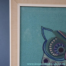 Load image into Gallery viewer, LARGE Kitsch Embroidery Turquoise Tweed Collage Panel Showing a Large Stylized Owl. In original 60s frame
