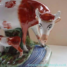 Load image into Gallery viewer, Large Staffordshire Spill Vase / Antique Figurine of a Cow Suckling her Calf by the Side of a River - Staffordshire
