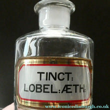 Load image into Gallery viewer, Larger Antique Clear Glass Chemist Bottle. TINCT: LOBEL: AETH with Original Foil Label and Lozenge Stopper
