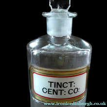 Load image into Gallery viewer, Larger Antique Clear Glass Chemist Bottle. TINCT: CENT: CO: with Original Foil Label and Lozenge Stopper

