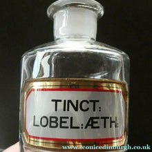 Load image into Gallery viewer, Larger Antique Clear Glass Chemist Bottle. TINCT: LOBEL: AETH with Original Foil Label and Lozenge Stopper
