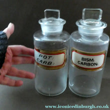 Load image into Gallery viewer, PAIR OF Larger Antique Clear Glass Chemist Bottles with Original Foil Labels and Lozenge Stoppers
