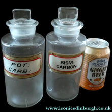 Load image into Gallery viewer, PAIR OF Larger Antique Clear Glass Chemist Bottles with Original Foil Labels and Lozenge Stoppers
