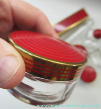 Load image into Gallery viewer, 1950s Red Enamel Topped and Glass Vanity Pots and Bottles. Vintage Glamour
