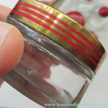 Load image into Gallery viewer, 1950s Red Enamel Topped and Glass Vanity Pots and Bottles. Vintage Glamour
