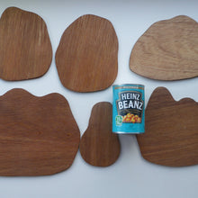 Load image into Gallery viewer, STRANGE 1950s Wooden Plate Mats - with Stylish Seaside or 1950s Beach Illustrations on each

