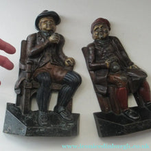 Load image into Gallery viewer, Pair OF VICTORIAN Polychrome Painted CAST IRON Door Stops, in the form of Tam O'Shanter and Souter Johnnie
