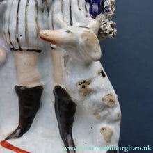 Load image into Gallery viewer, Rarer ANTIQUE Staffordshire Figurine / Spill Vase Featuring a Man and Woman with Dog Standing Beside a Tree
