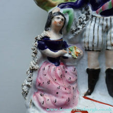 Load image into Gallery viewer, Rarer ANTIQUE Staffordshire Figurine / Spill Vase Featuring a Man and Woman with Dog Standing Beside a Tree
