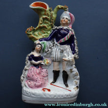 Load image into Gallery viewer, Rarer ANTIQUE Staffordshire Figurine / Spill Vase Featuring a Man and Woman with Dog Standing Beside a Tree
