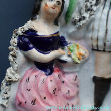 Load image into Gallery viewer, Rarer ANTIQUE Staffordshire Figurine / Spill Vase Featuring a Man and Woman with Dog Standing Beside a Tree
