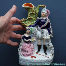 Load image into Gallery viewer, Rarer ANTIQUE Staffordshire Figurine / Spill Vase Featuring a Man and Woman with Dog Standing Beside a Tree
