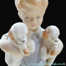 Load image into Gallery viewer, Royal Worcester Figurine. ALL MINE.  Modelled by Freda Doughty. No 3519. Boy Holding Puppies
