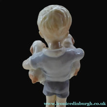 Load image into Gallery viewer, Royal Worcester Figurine. ALL MINE.  Modelled by Freda Doughty. No 3519. Boy Holding Puppies
