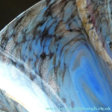 Load image into Gallery viewer, SCOTTISH GLASS. MONART Glass Vase. Thistle Shape. Mottled Powder Blue and Black Flecks &amp; Gold Aventurine at the Rim
