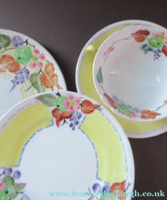 Load image into Gallery viewer, Antique 1920s Hand Painted MAK MERRY Pottery Trio. Cup, Saucer and Side Plate and Another Larger Plate

