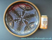 Load image into Gallery viewer, Large 1970s Round Shallow Plate. Davey Pottery, Castle Douglas, Kirkcudbrightshire. Abstract Design with Strange Creatures
