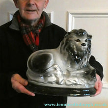 Load image into Gallery viewer, Large ANTIQUE Victorian Staffordshire GREY Recumbent Lion with Glass Eyes. 11 inches in length
