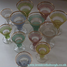 Load image into Gallery viewer, Selection of 1950s Harlequin Footed Drinking / Cocktail Glasses. Conical Shape with Frosted Pastel Stripes and Gold Gilt Embellishments

