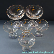 Load image into Gallery viewer, Set of SIX Vintage Matching 1970s BABYCHAM Coupe or Saucer Shape Glasses - with Brighter Yellow Bambi Motif
