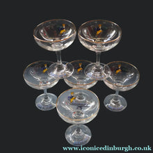 Load image into Gallery viewer, Set of SIX Vintage Matching 1970s BABYCHAM Coupe or Saucer Shape Glasses - with Brighter Yellow Bambi Motif

