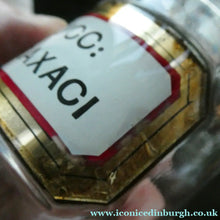 Load image into Gallery viewer, Small Antique Clear Glass Chemist Bottle. SUCC: TARAXACI with Original Foil Label and Lozenge Stopper
