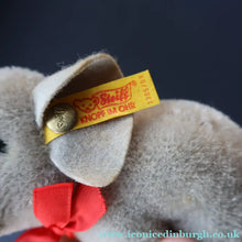 Load image into Gallery viewer, Miniature Steiff Miniature Elephant (EAN 1305/09) with Button Yellow Ribbon and Paper Label - Vintage Teddy Bear
