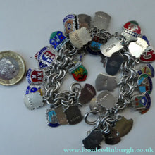 Load image into Gallery viewer, SILVER BRACELET with 36 Vintage SILVER and Enamel Towns Charms. Souvenirs of a Visit to the Town
