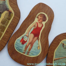 Load image into Gallery viewer, STRANGE 1950s Wooden Plate Mats - with Stylish Seaside or 1950s Beach Illustrations on each
