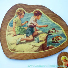 Load image into Gallery viewer, STRANGE 1950s Wooden Plate Mats - with Stylish Seaside or 1950s Beach Illustrations on each
