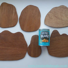 Load image into Gallery viewer, STRANGE 1950s Wooden Plate Mats - with Stylish Seaside or 1950s Beach Illustrations on each
