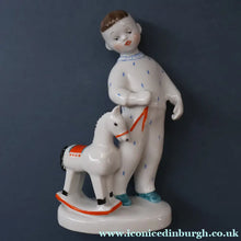 Load image into Gallery viewer, Very Rare Lomonosov SOVIET Figurine of a Little Boy with a Toy Rocking Horse
