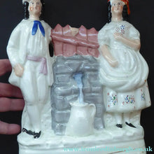 Load image into Gallery viewer, Antique STAFFORDSHIRE Flatback Figurine. Victorian Couple Standing Beside a Water Wall. Excellent Condition
