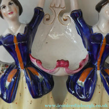 Load image into Gallery viewer, Antique Staffordshire Figurine. Pair of Scottish Lasses Dancing. Antique Ceramic Pocket Watch Holder
