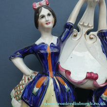 Load image into Gallery viewer, Antique Staffordshire Figurine. Pair of Scottish Lasses Dancing. Antique Ceramic Pocket Watch Holder
