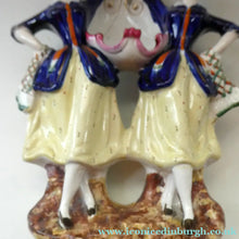 Load image into Gallery viewer, Antique Staffordshire Figurine. Pair of Scottish Lasses Dancing. Antique Ceramic Pocket Watch Holder
