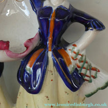Load image into Gallery viewer, Antique Staffordshire Figurine. Pair of Scottish Lasses Dancing. Antique Ceramic Pocket Watch Holder
