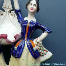 Load image into Gallery viewer, Antique Staffordshire Figurine. Pair of Scottish Lasses Dancing. Antique Ceramic Pocket Watch Holder
