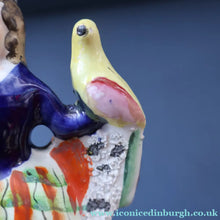 Load image into Gallery viewer, Antique STAFFORDSHIRE Figurine. Little Child in Kilt Standing on a Chair. A Pheasant Perching on Chair Back
