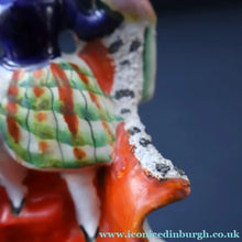 Load image into Gallery viewer, Antique STAFFORDSHIRE Figurine. Little Child in Kilt Standing on a Chair. A Pheasant Perching on Chair Back
