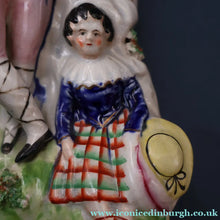 Load image into Gallery viewer, Antique STAFFORDSHIRE Figurine. Rarer Modelled Group: A Huntsman and Little Seated Girl. Excellent Condition. 10 1/4 inches high
