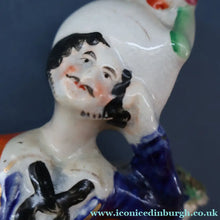 Load image into Gallery viewer, Antique STAFFORDSHIRE Figurine. Rarer Modelled Group: A Huntsman and Little Seated Girl. Excellent Condition. 10 1/4 inches high
