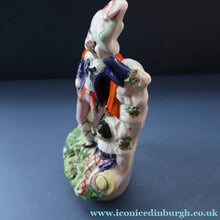 Load image into Gallery viewer, Antique STAFFORDSHIRE Figurine. Rarer Modelled Group: A Huntsman and Little Seated Girl. Excellent Condition. 10 1/4 inches high
